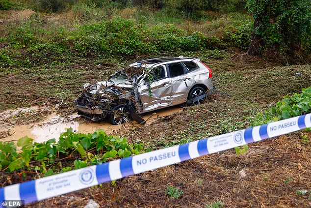 A view of the wreckage of a vehicle that was swept away by heavy rain in Olivella, Barcelona, Spain, 17 September 2026. Authorities confirmed today the passenger was a British man