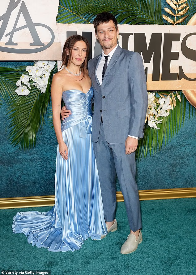 Stranger Things star Millie Bobby Brown has welcomed her second child at 22 with husband Jake Bongiovi (Above, the couple in New York in June)