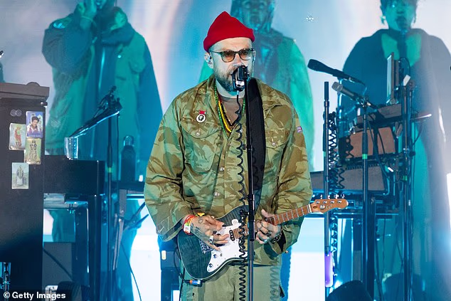 Damon Albarn is the latest musician to turn his back on Ed Sheeran as he draped a Palestinian flag on his shoulder and declared: 'Don't ever be neutral'