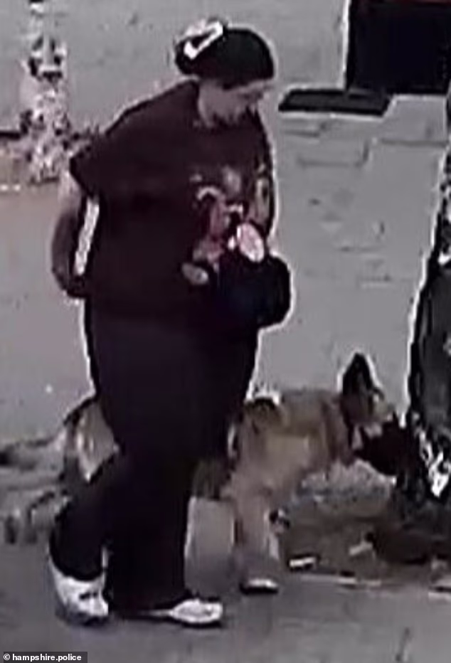 Police have released CCTV images of a woman they would like to speak to along with a dog believed to be a German Shepherd, which was wearing a soft mesh-style muzzle