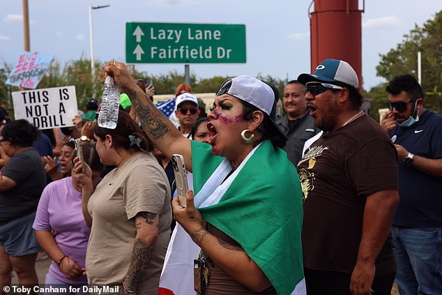 Police in Austin were locked in a standoff on Sunday evening with a squad of rock-hurling protesters, enraged after a Venezuelan man Wilber Rafael Garces Perez was shot - allegedly in the back - by Immigration and Customs Enforcement officers, whilst he was delivering food