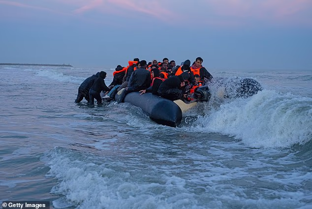 File photo of a migrant dinghy leaving Gravelines, France on Monday. People smugglers are moving their activities further west to avoid detection
