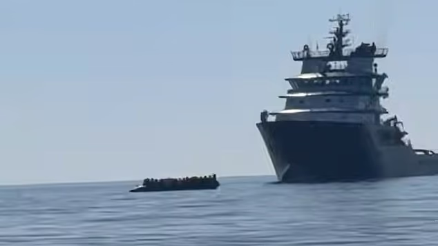 The mega-dinghy with at least 60 on board began its 38-hour journey escorted by the French Navy...