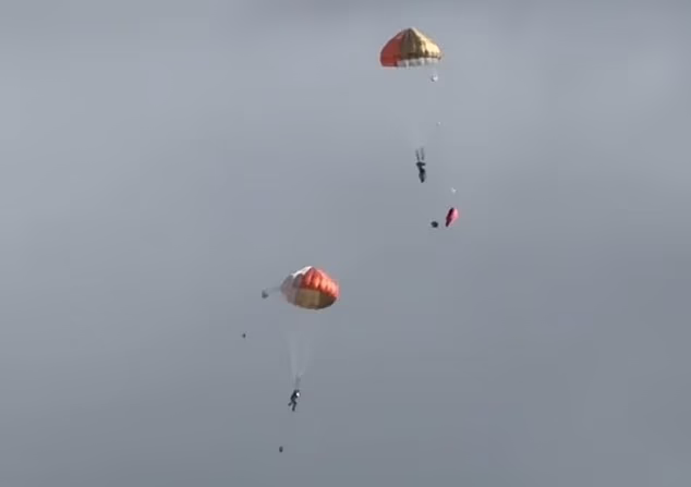 The Hawk T2 training aircraft crashed moments after taking off, with both pilots ejecting safely (pictured)
