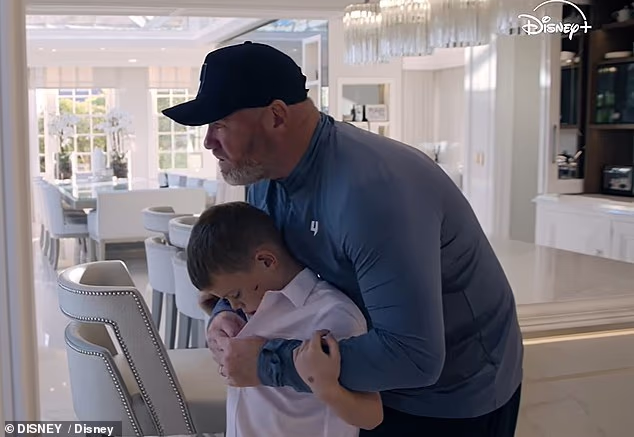 Wayne Rooney has revealed why he and Coleen refuse to hire a nanny despite struggling with the challenge of raising four sons (pictured with youngest son Cass)