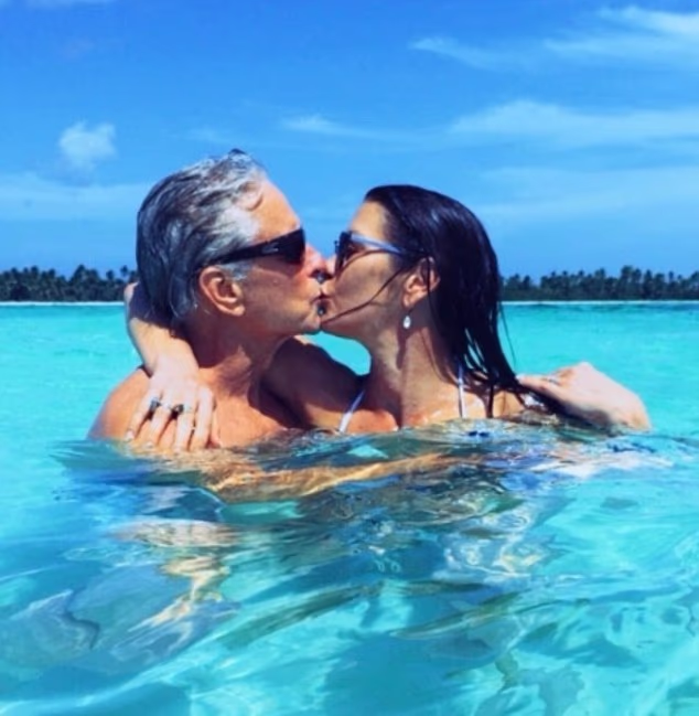 Catherine Zeta-Jones shared a passionate kiss with her husband Michael Douglas as they celebrated his 82nd birthday with a gushing post on Instagram on Friday