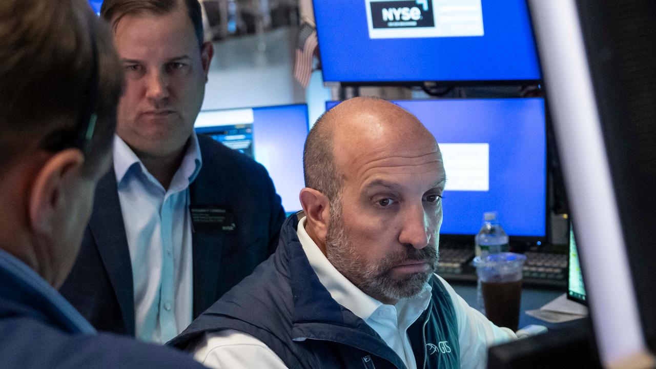 Wall St slips as calls for AI slowdown hit chip stocks