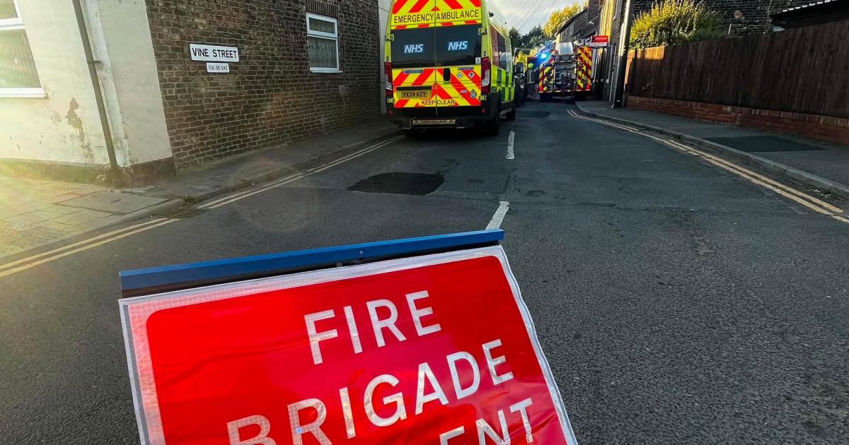 Emergency services at scene of house fire in Norton
