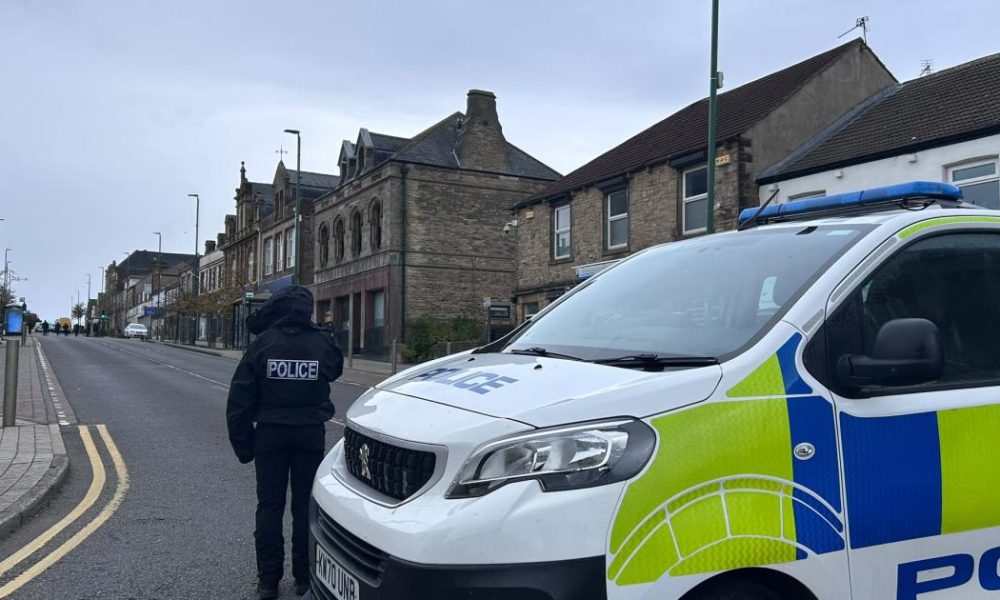 Moment police swarmed County Durham street during rush hour