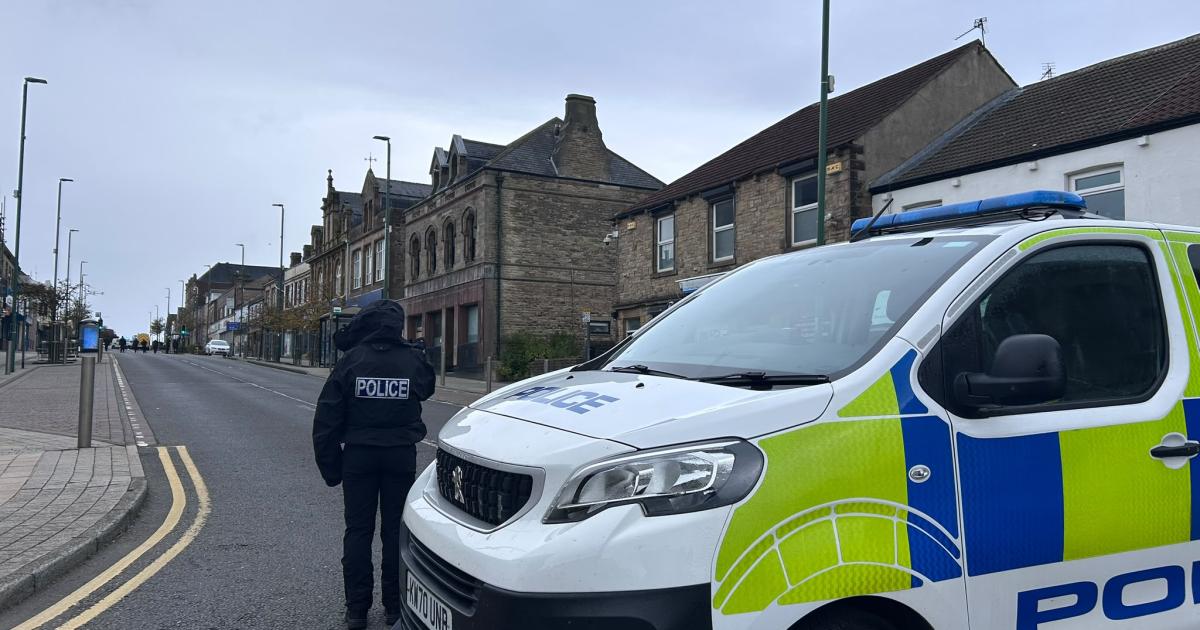 Moment police swarmed County Durham street during rush hour