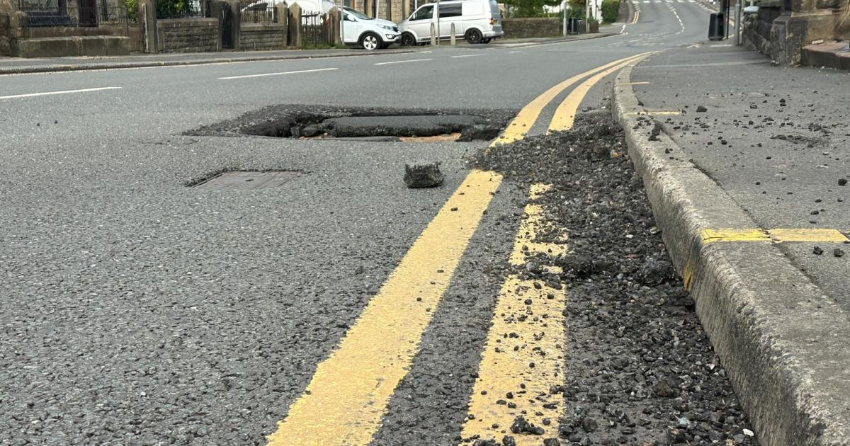 Pothole returns on busy Darwen Road in Bromley Cross
