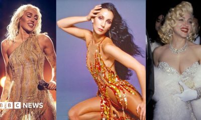 Cher in a feather headdress, 1986.