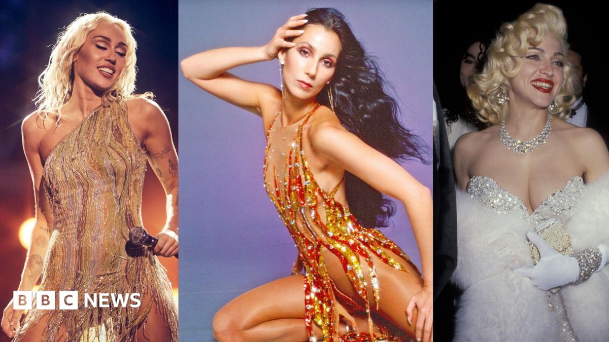 Cher in a feather headdress, 1986.