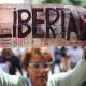 A woman holds a sign during a demonstration calling for the return of opposition leader Maria Corina Machado and free elections in Venezuela, in Caracas.