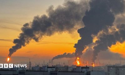 Plumes of smoke rise from fires at an oil refinery in Moscow after an overnight Ukrainian drone attack. Photo: 20 September 2026