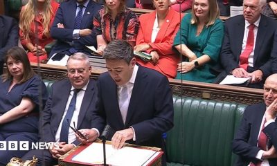 Andy Burnham stands in the House of Commons