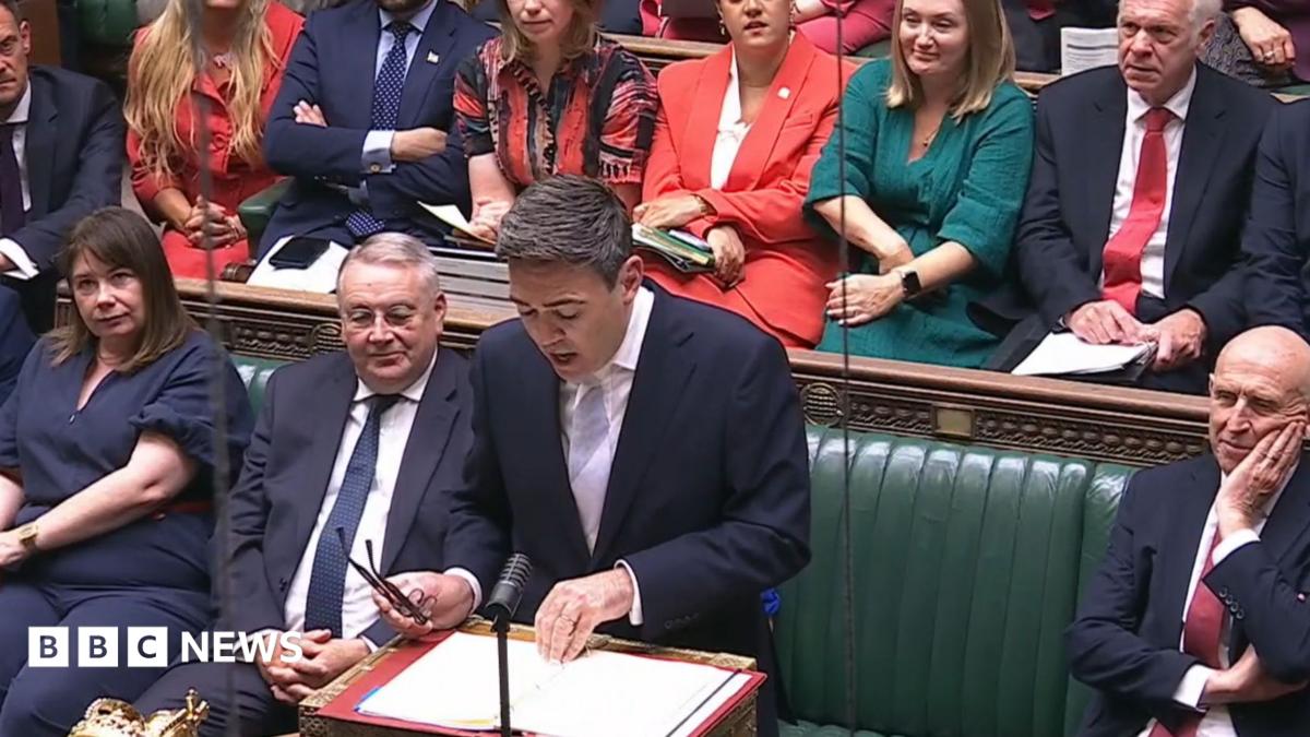 Andy Burnham stands in the House of Commons