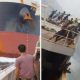 A split screen of a cargo ship heading in the direction of another fishing vessel, and on the right the fishing vessel tipping after being hit.