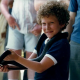 The author age 7. "I loved snakes and I was fearless," they write.