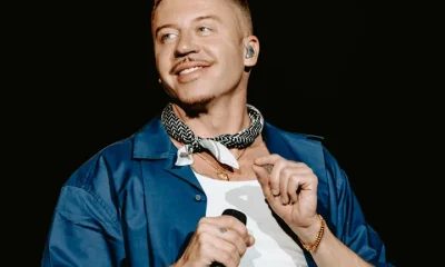 Macklemore performing in 2024