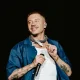 Macklemore performing in 2024