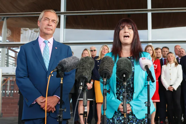 The new Welsh Reform UK Leader Helen Jenner speaks on the steps of the Sennedd beside Reform UK leader Nigel Farage, on September 21, 2026