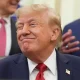 President Donald Trump reacts during an event about healthcare in the Oval Office of the White House, Friday Sept. 18, 2026, in Washington. (AP Photo/Jacquelyn Martin)