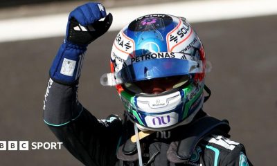 Kimi Antonelli clenches his fist in celebration after winning the Spanish Grand Prix