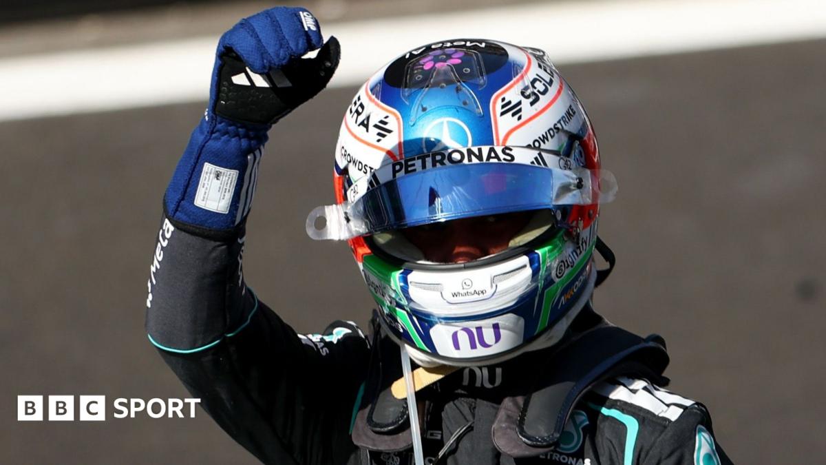 Kimi Antonelli clenches his fist in celebration after winning the Spanish Grand Prix