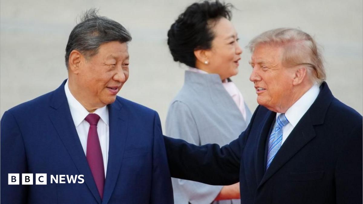 US President Donald Trump right greets Chinese President Xi Jinping upon arrival at Joint Base Andrews in Maryland on 23 September 2026.