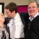 Andy Burnham hugs his parents, Eileen and Roy, after he was selected as the Labour candidate to become the mayor of Greater Manchester in September 2026. They are standing in front of a red banner reading "Labour North West".