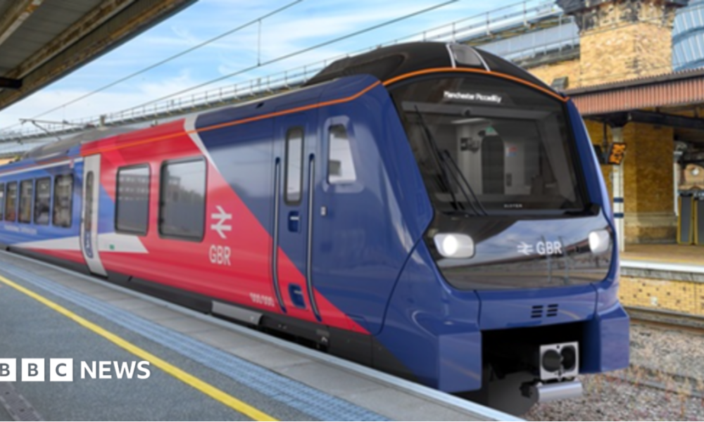 A red and blue train is parked up at station