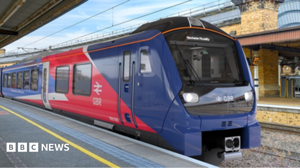 A red and blue train is parked up at station