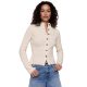 A woman wearing blue jeans and an off-white cardigan