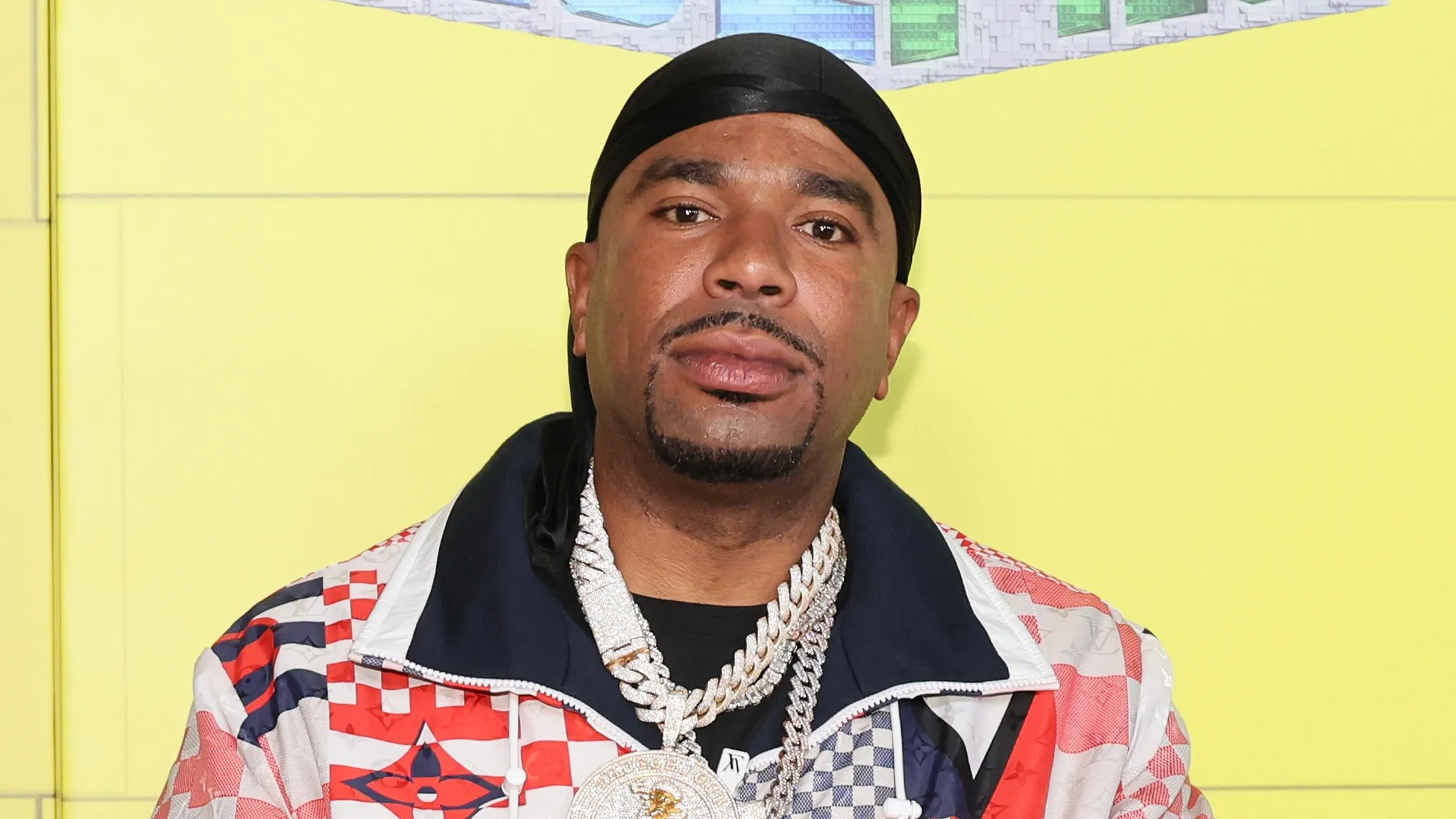 Carmen Bryan, Mom Of Nas's Oldest Child, Sues N.O.R.E. For Alleged 1999 Sexual Assault