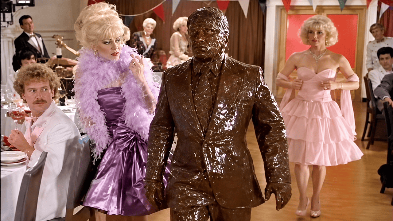 Pitch-Black R-Rated 80s Comedy Is Willy Wonka Meets Soylent Green 