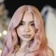 Feeling It? Social Media Weighs In After Ice Spice Reveals ‘Saint’ and ‘Sinner’ Thigh Tattoos (VIDEO)