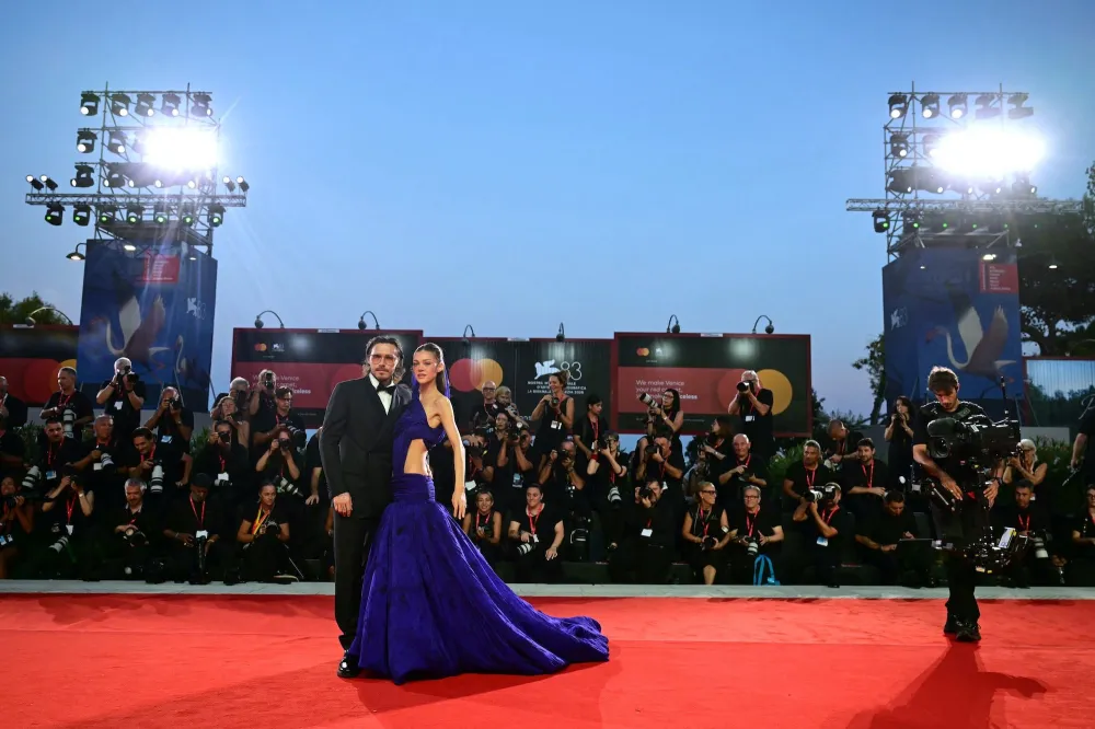 GettyImages-2293192850 Brooklyn Beckham and Wife Nicola Peltz Pack on the PDA on Venice Film Festival Red Carpet
