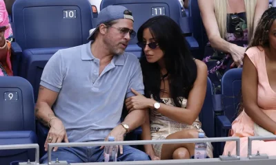 GettyImages-2294446856 Brad Pitt Cuddles Up to Girlfriend Ines de Ramon and Poses for Selfies With Fans at US Open