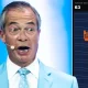 Nigel Farage with a screenshot from the Small Boat Scramble game.
