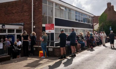 Locals forced to wait hours at Royal Mail depot after six weeks without post | News UK