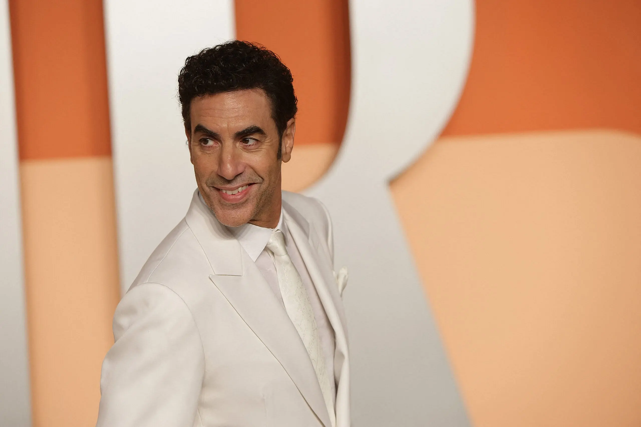 Sacha Baron Cohen at the 2025 Vanity Fair Oscar Party