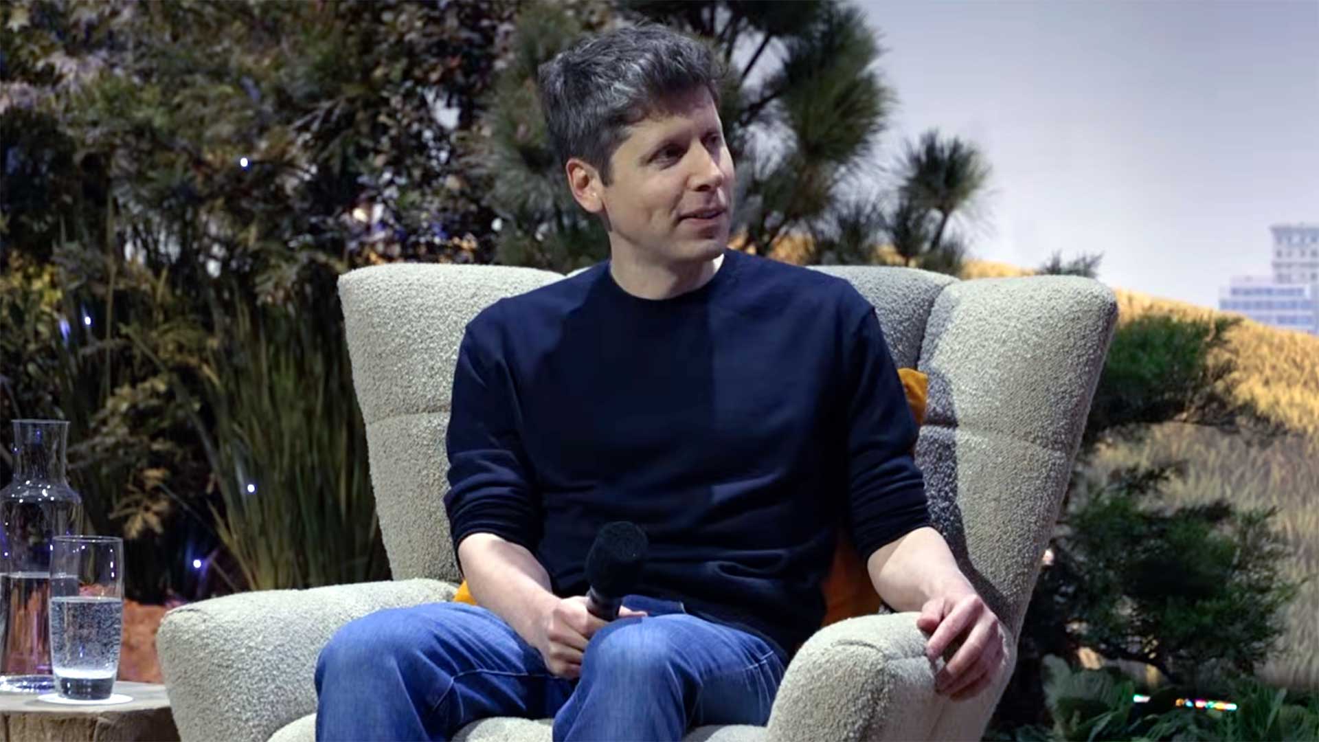 Altman says world should trust AI firms