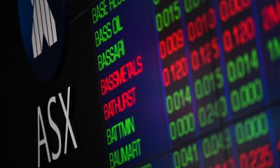 Aussie shares limp across the line to end volatile week