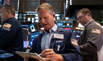 Wall Street ends lower as oil passes $US100 per barrel