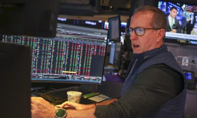 Wall St ends lower on higher yields, rising oil prices