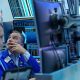 Wall Street ends mixed after tumultuous week
