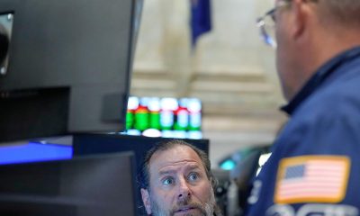 Wall Street closes higher as AI optimism reignites