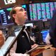 Wall St closes higher as oil eases, Treasury yields dip