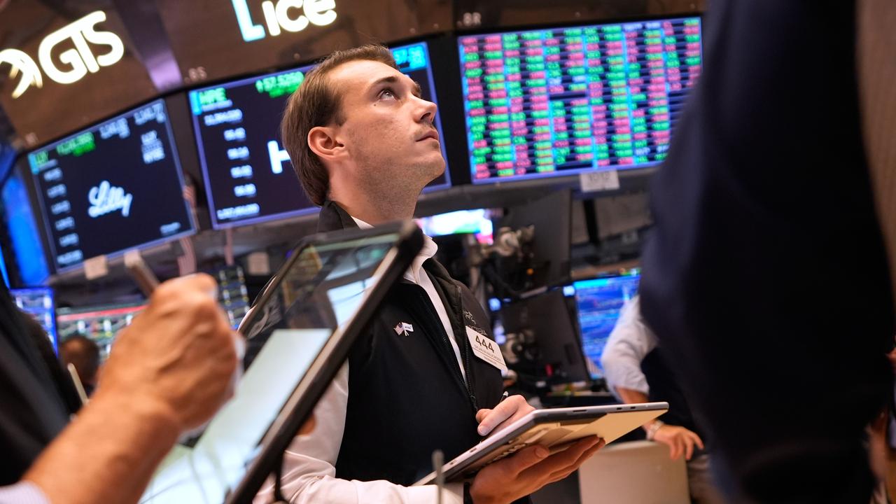 Wall St closes higher as oil eases, Treasury yields dip